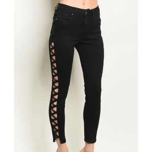 High waisted side cut out detail skinny jeans.